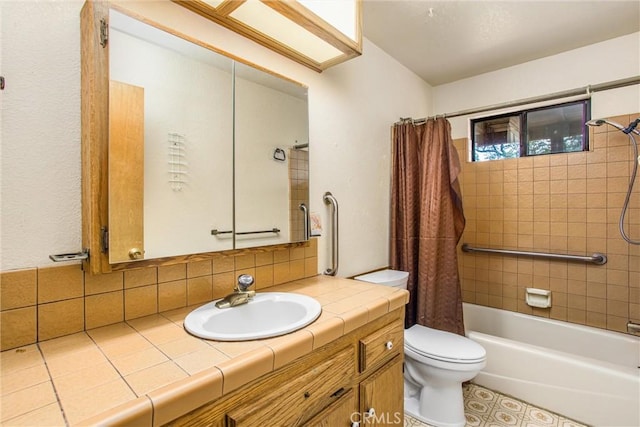 full bathroom with shower / bath combo, vanity, tile patterned flooring, toilet, and tasteful backsplash