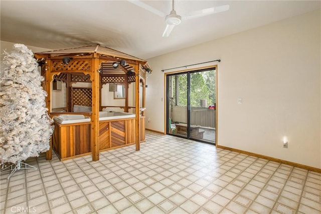 kitchen with vaulted ceiling and ceiling fan