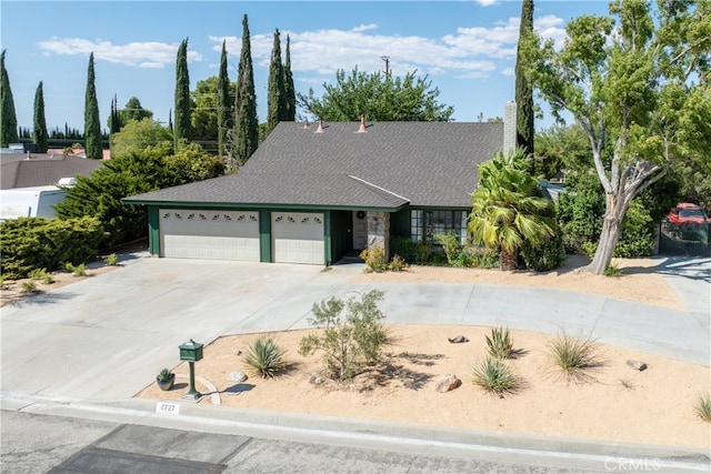 ranch-style home with a garage