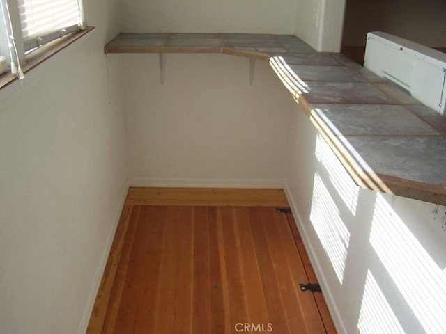 spacious closet featuring wood-type flooring