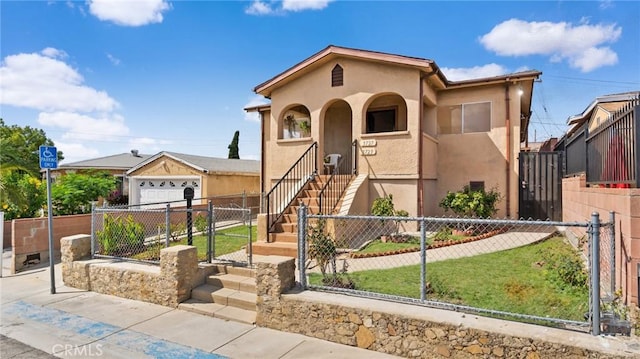 view of front facade featuring a front yard and a garage