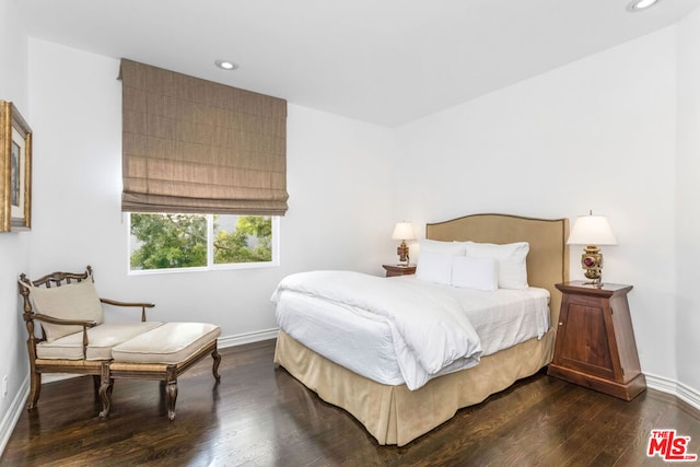 bedroom featuring dark hardwood / wood-style floors