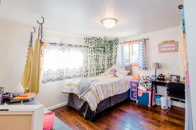 bedroom featuring dark hardwood / wood-style floors