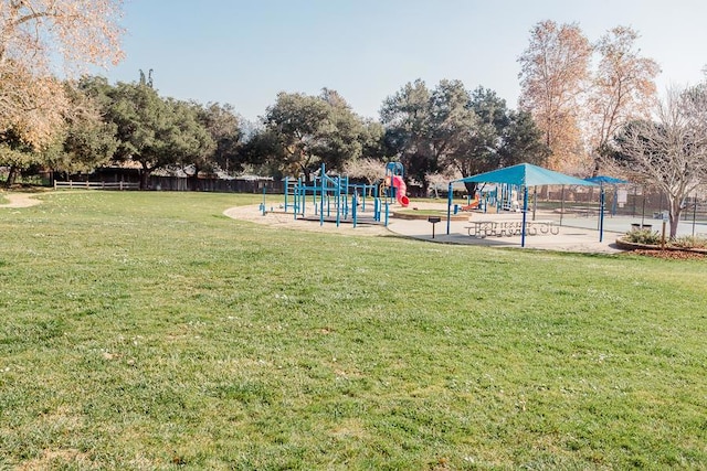 view of play area featuring a lawn