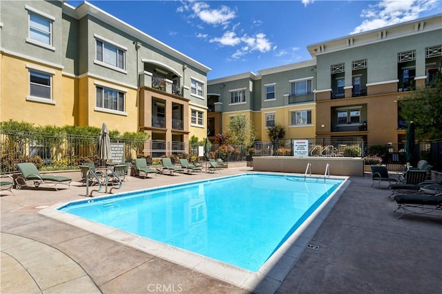 view of pool featuring a patio area