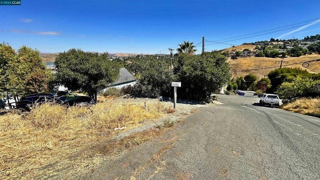 view of street featuring a rural view