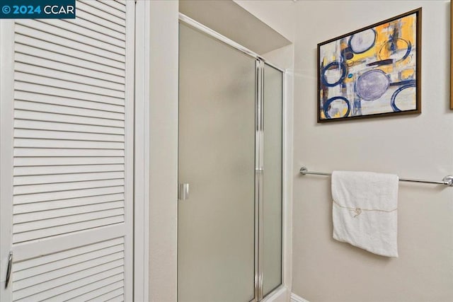 bathroom with an enclosed shower