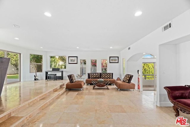 living room with a healthy amount of sunlight