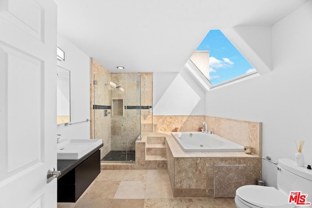 full bathroom with toilet, vanity, a skylight, and shower with separate bathtub