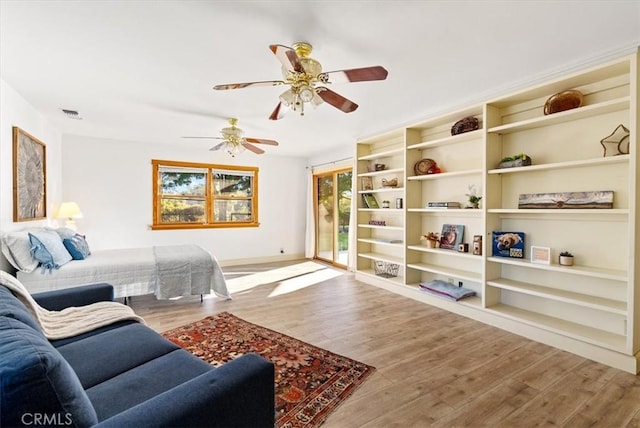 interior space featuring ceiling fan and hardwood / wood-style flooring