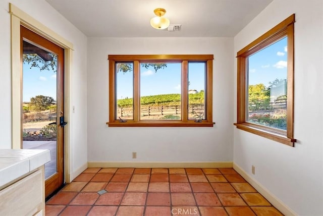 interior space featuring light tile patterned floors