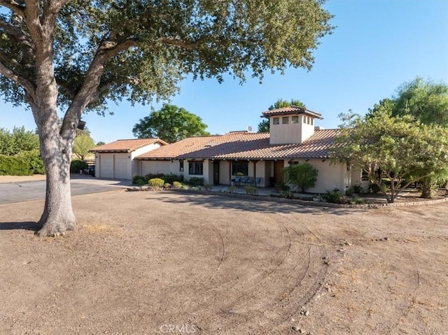 view of front of property with a garage