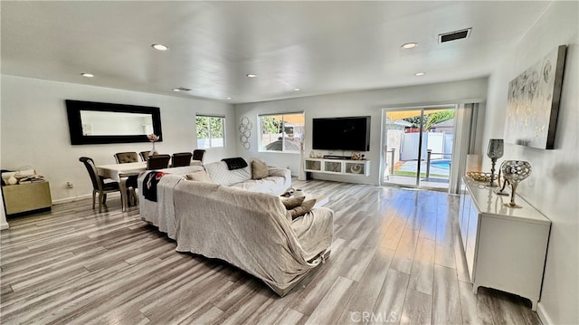 living room with light wood-type flooring