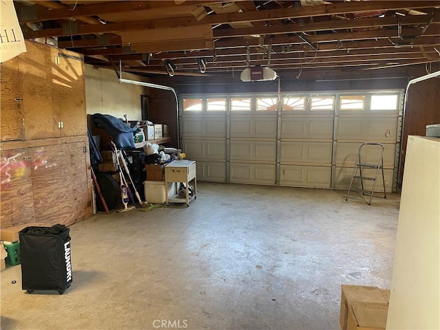 garage featuring a garage door opener