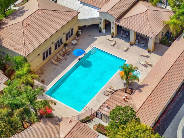 view of swimming pool featuring a patio