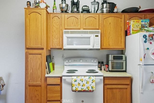 kitchen featuring white appliances