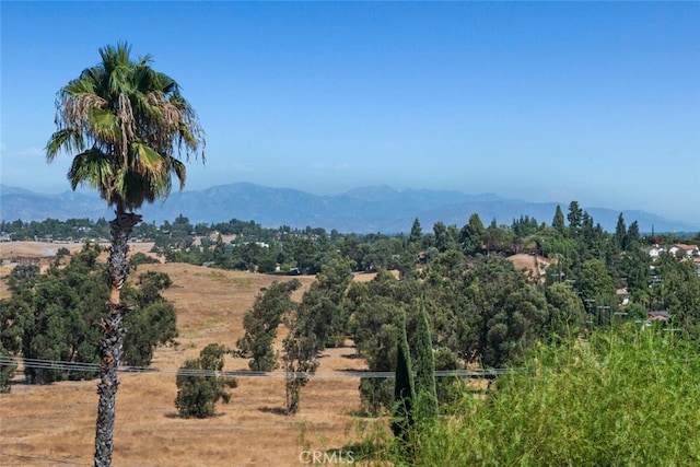 property view of mountains featuring a rural view