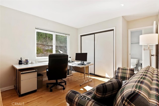 home office featuring light wood-type flooring