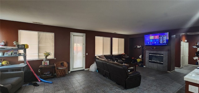 living room featuring a fireplace