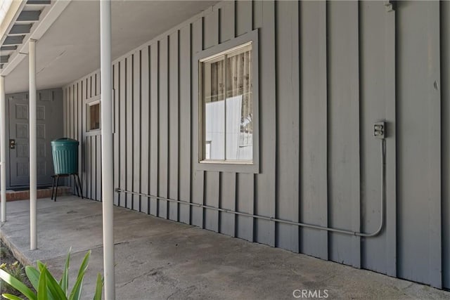 view of side of property featuring board and batten siding