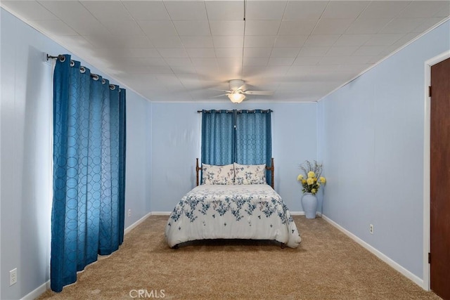 bedroom with carpet floors and a ceiling fan