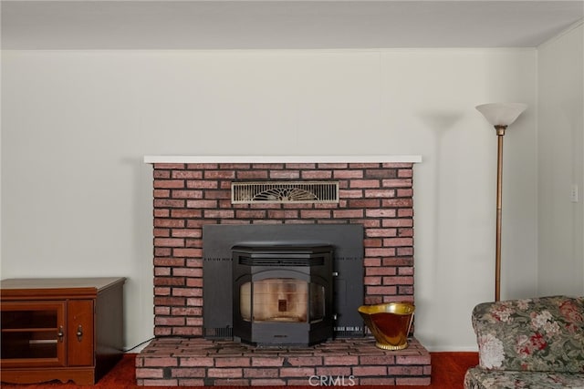 room details with carpet and a wood stove