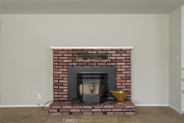 interior details with carpet floors, visible vents, and baseboards