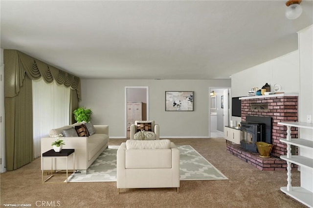 carpeted living room with a wood stove