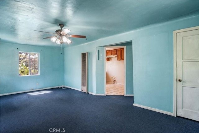 unfurnished bedroom with carpet floors and ceiling fan