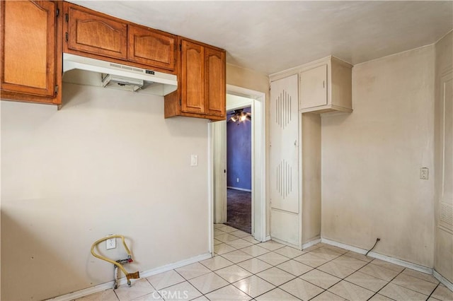 kitchen with light tile patterned floors