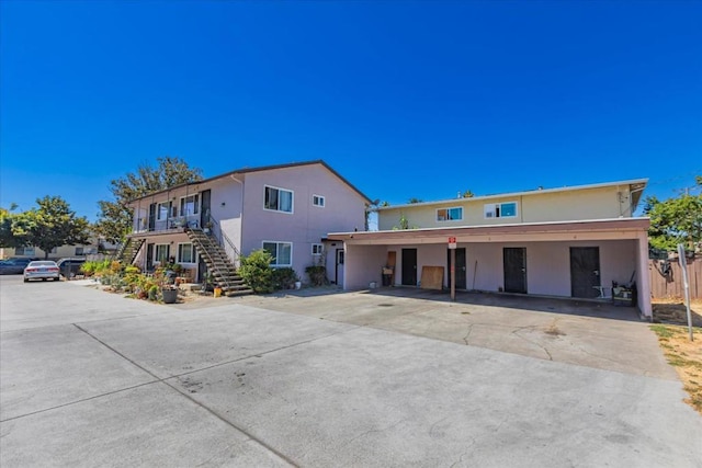 view of front of house featuring a carport