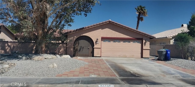 view of front of home featuring a garage