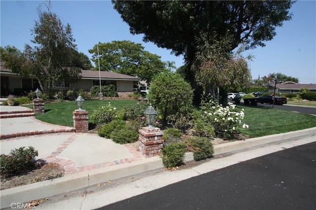 exterior space featuring a front yard