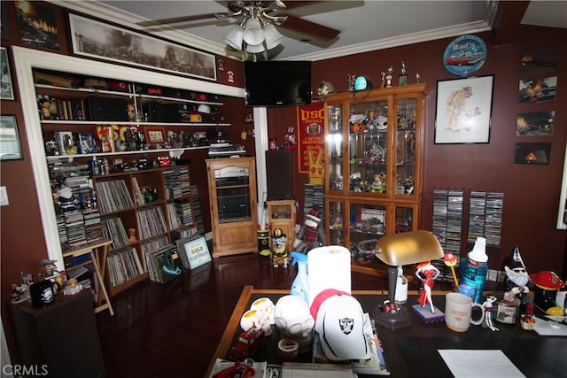 dining area featuring wood-type flooring, crown molding, and ceiling fan