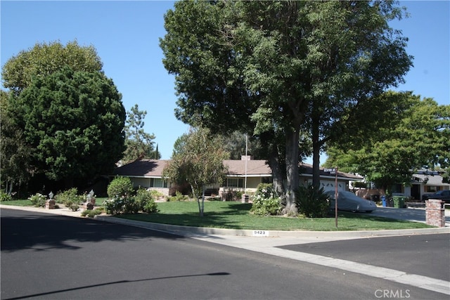 view of front of home with a front yard