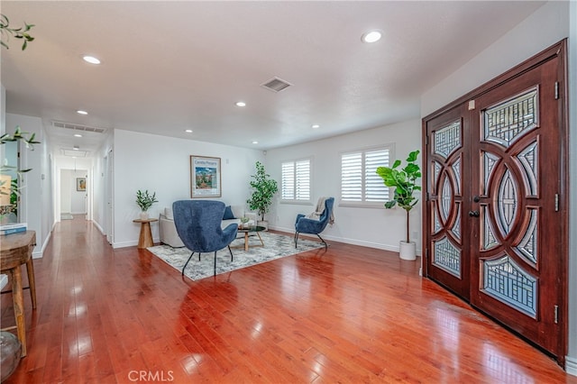 entrance foyer featuring wood-type flooring