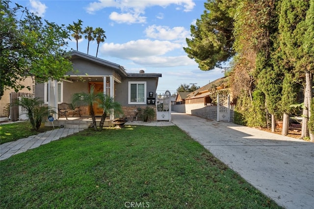 view of front of property with a front lawn