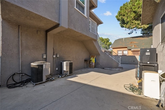 view of patio with central AC