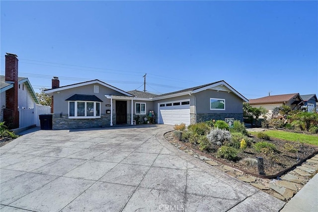 ranch-style house featuring a garage