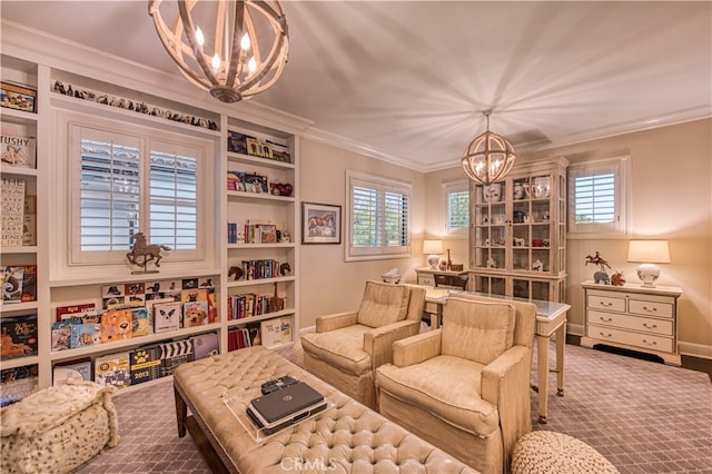 sitting room with crown molding, an inviting chandelier, and a wealth of natural light