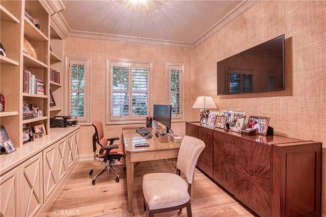 office space featuring crown molding and light wood finished floors