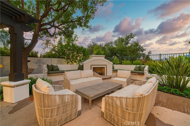 patio terrace at dusk with outdoor lounge area