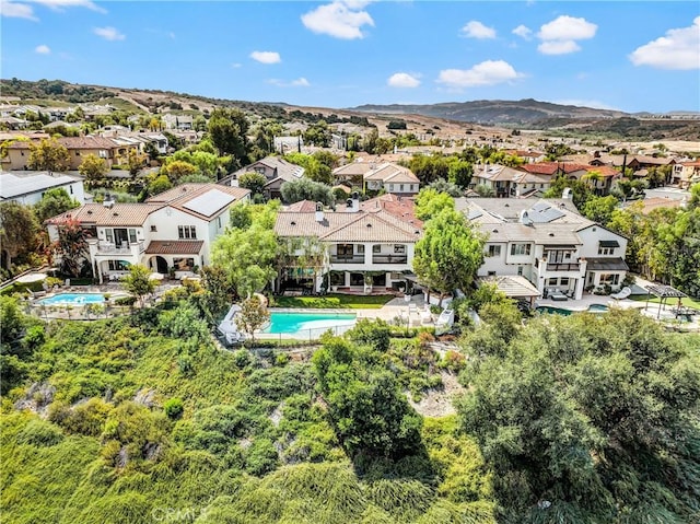 bird's eye view with a mountain view and a residential view