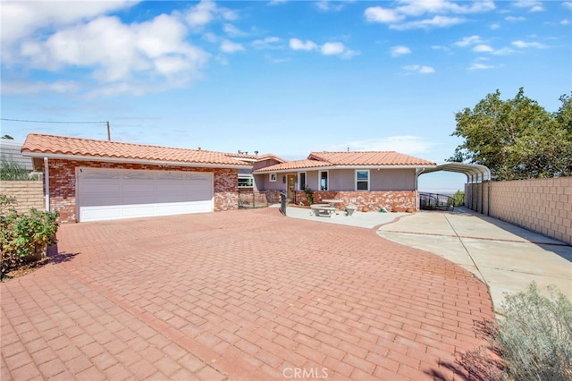 single story home with a garage