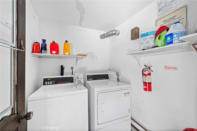 laundry area featuring washing machine and dryer