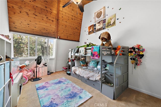 carpeted bedroom featuring beamed ceiling, high vaulted ceiling, and ceiling fan