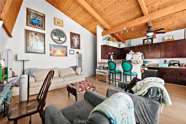 living room with ceiling fan, light hardwood / wood-style flooring, beamed ceiling, and wooden ceiling