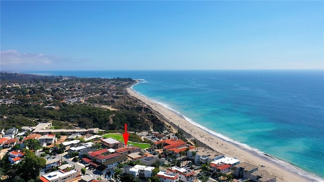 aerial view featuring a water view and a beach view