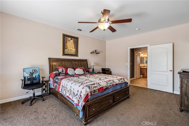 carpeted bedroom with ceiling fan and connected bathroom