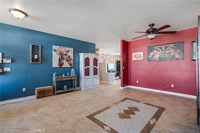 living room featuring light tile patterned floors and ceiling fan